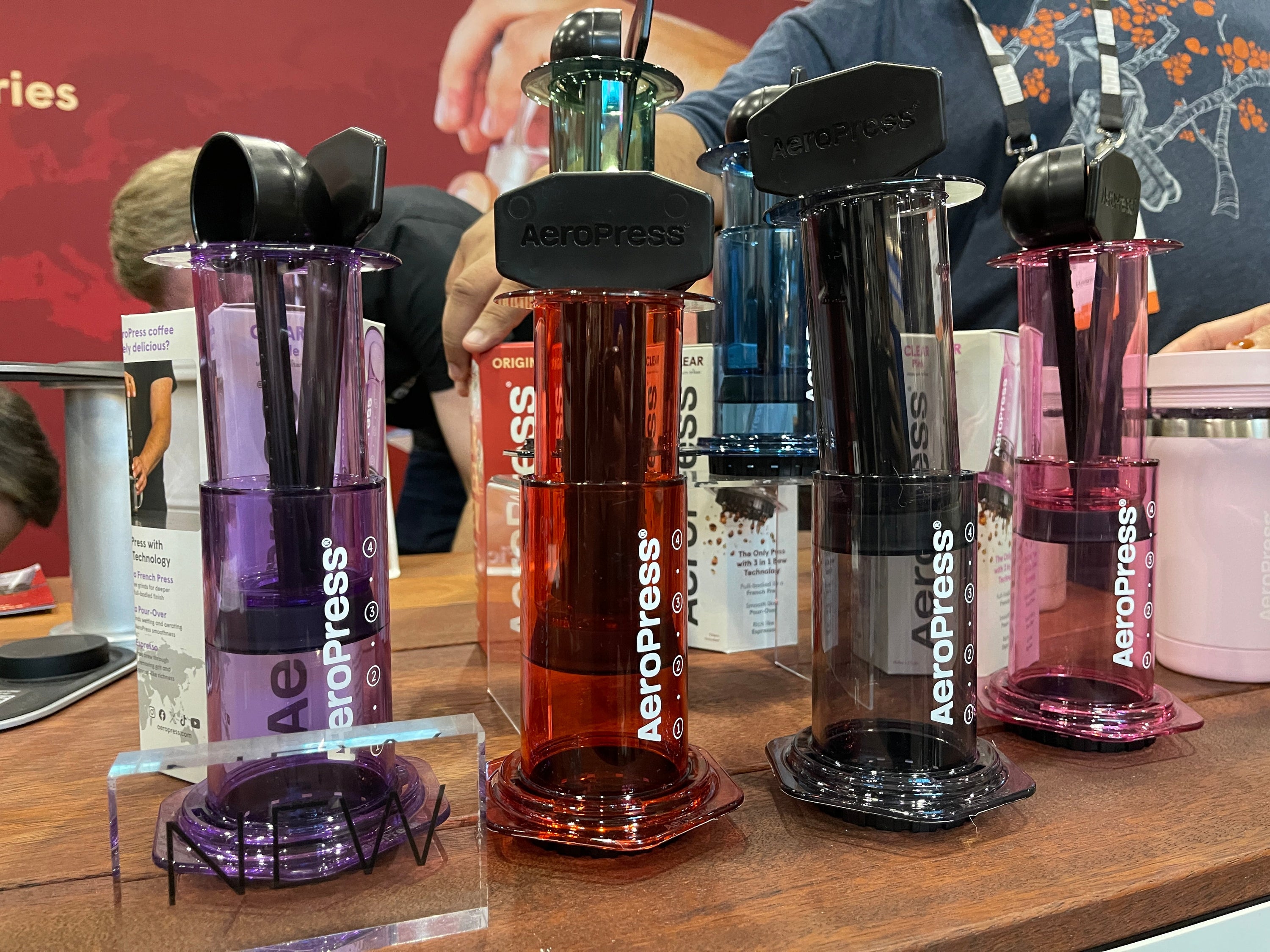 AeroPress coffee makers are made of Tritan. They are lined up for display at MICE 2025.