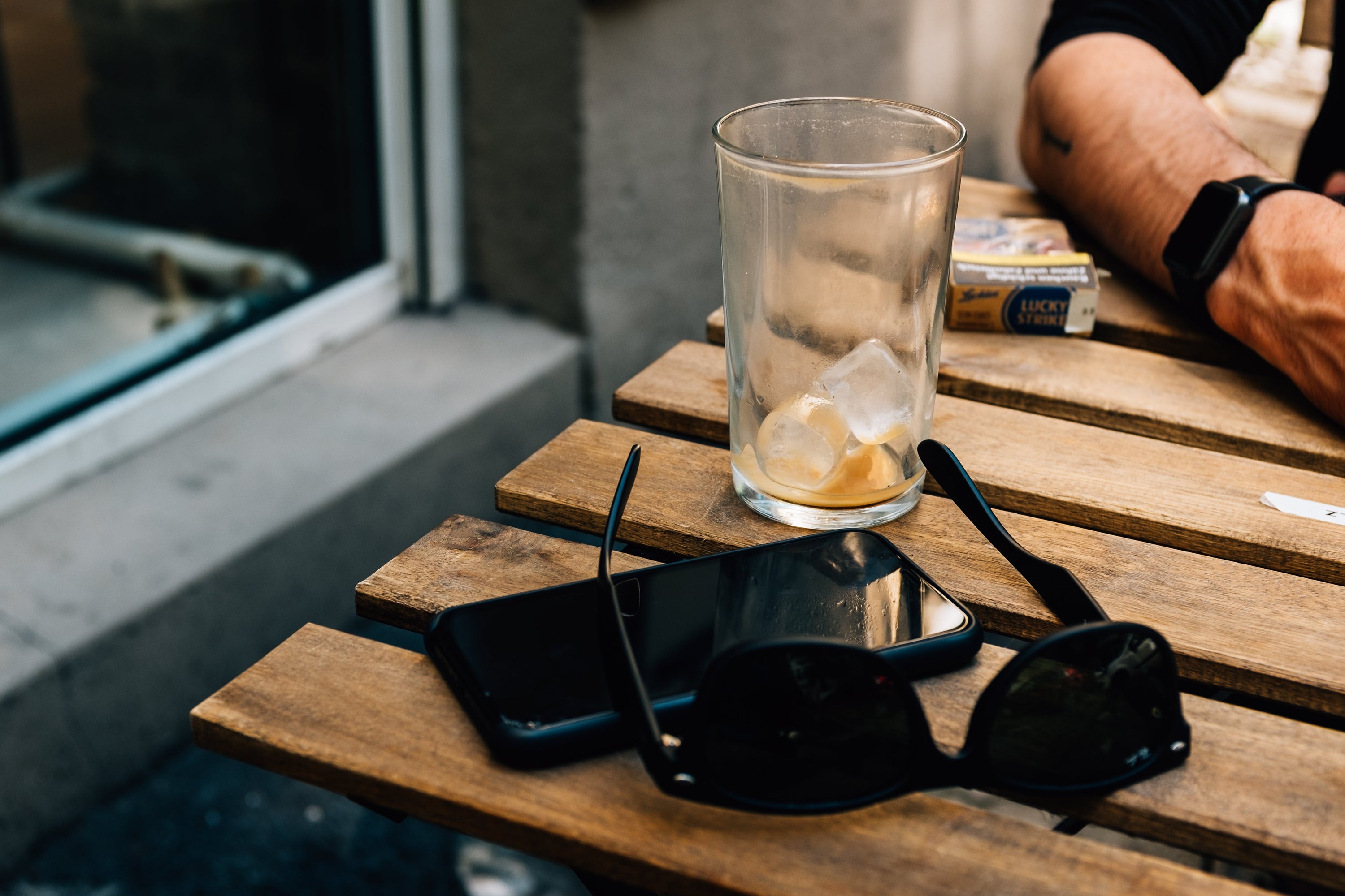 man sitting outside a local cafe in Sydney